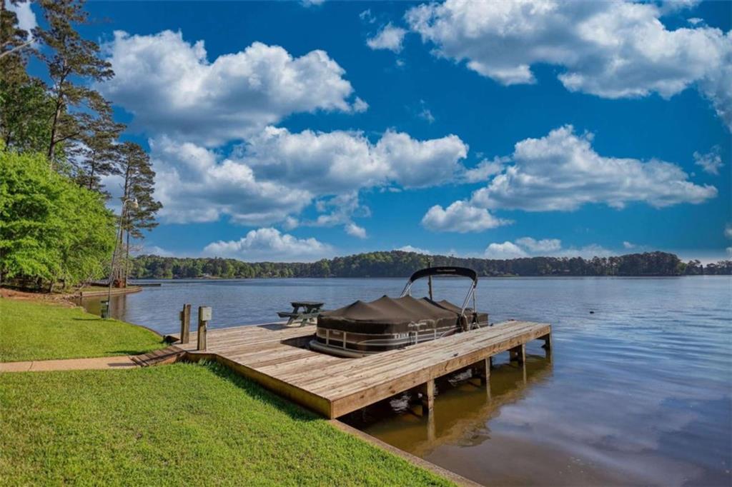 255 Old Hardy Farm Road Jackson, GA 30233 - Photo 9 of 78 a view of a lake with furniture