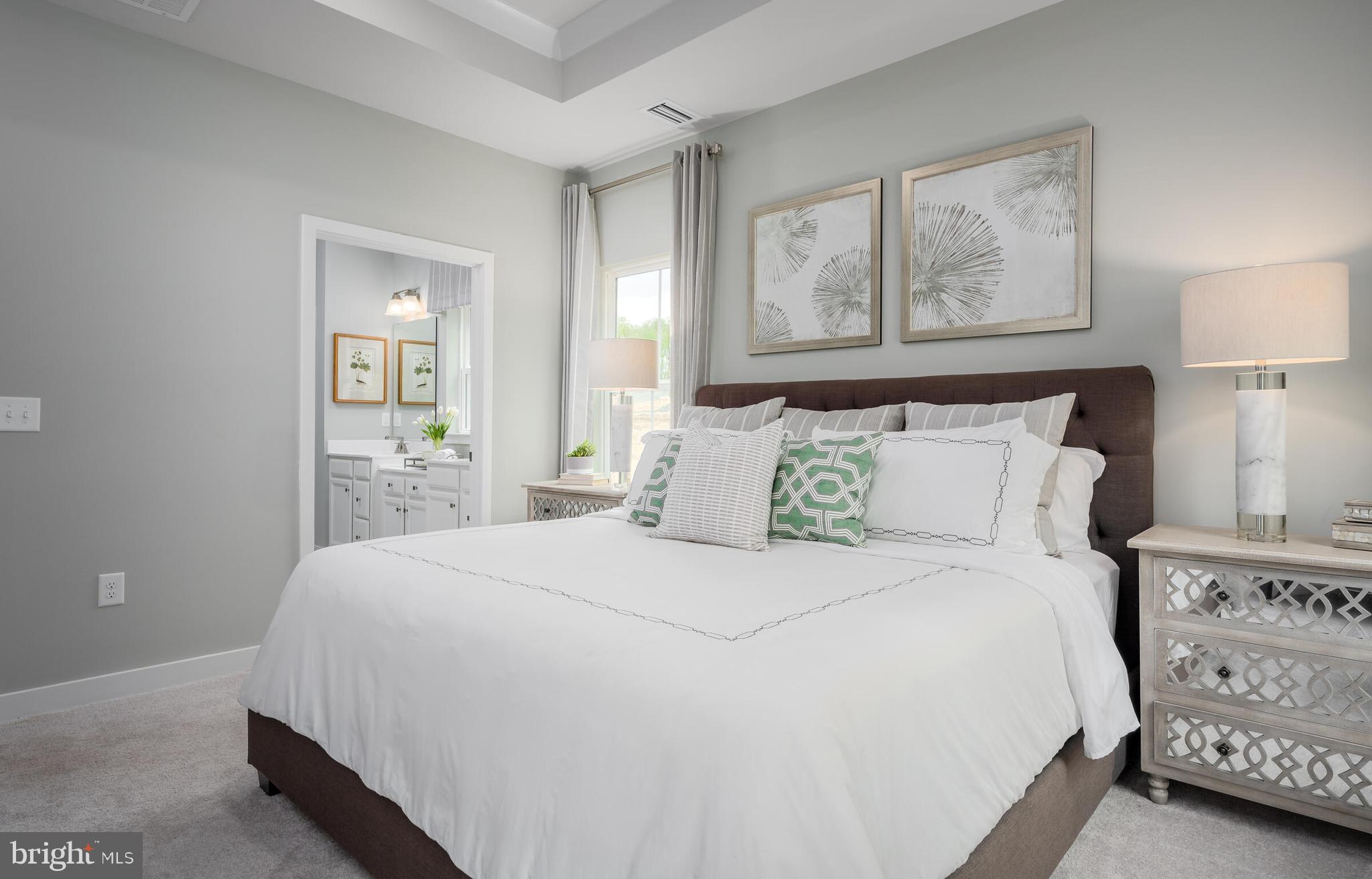 4004 Rudy Drive Sykesville, MD 21784 - Photo 16 of 24 a bedroom with a bed and a night stand