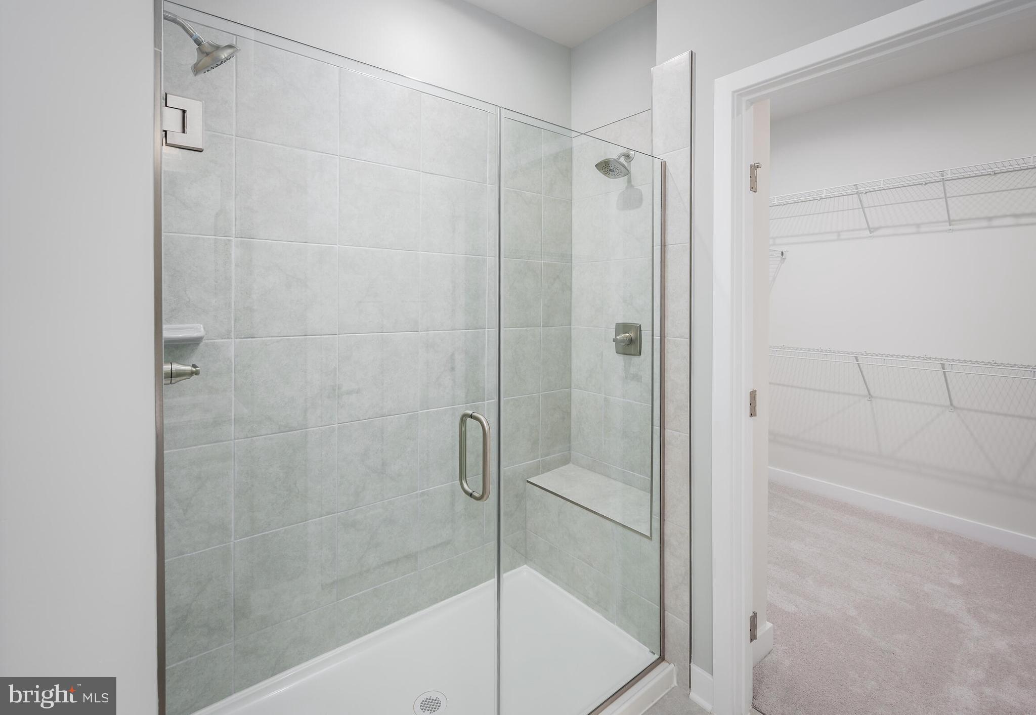 4004 Rudy Drive Sykesville, MD 21784 - Photo 18 of 24 a bathroom with a shower and a bath tub