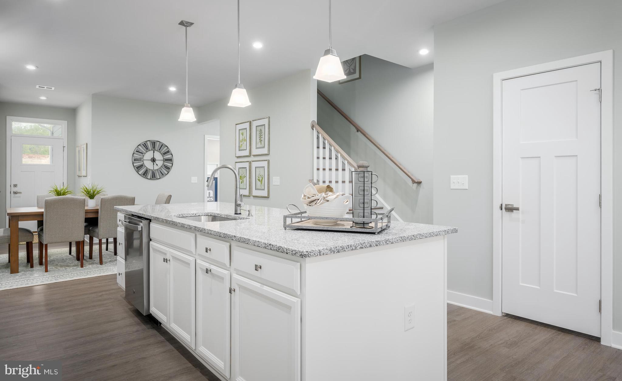 4004 Rudy Drive Sykesville, MD 21784 - Photo 10 of 24 a view of a kitchen cabinets and chandelier