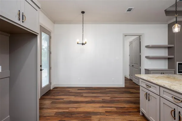 a view of a dining room with furniture