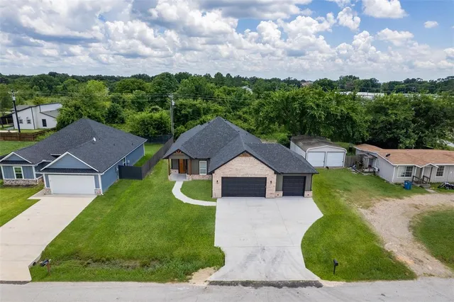 an aerial view of residential building with outdoor space