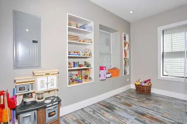 a view of livingroom with furniture and toys
