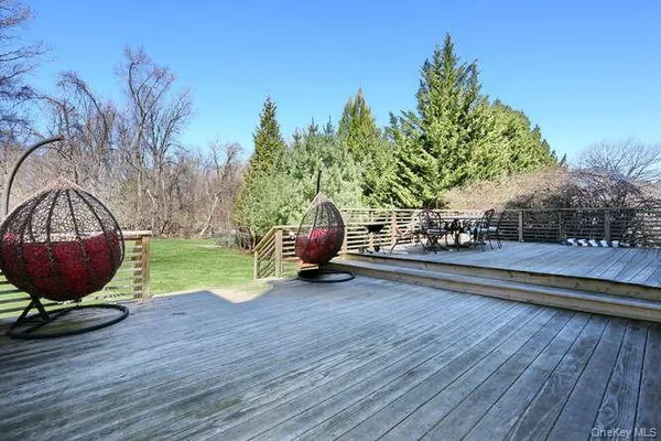 a view of a backyard with plants and a garden