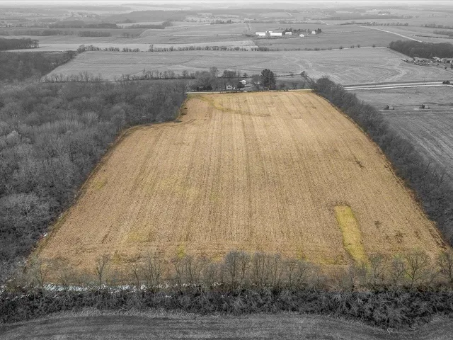 a view of swimming pool and ocean in background