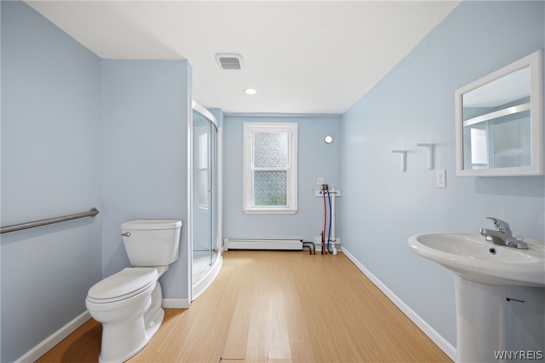 8279 Erie Road Evans, NY 14006 - Photo 5 of 5 Handicap accessible bathroom with laundry hookups