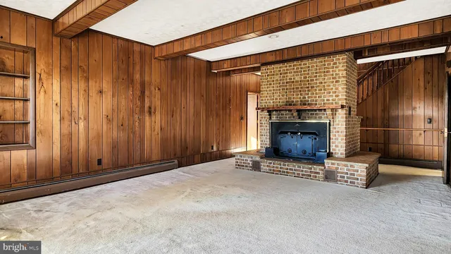 a view of an entryway with a fireplace