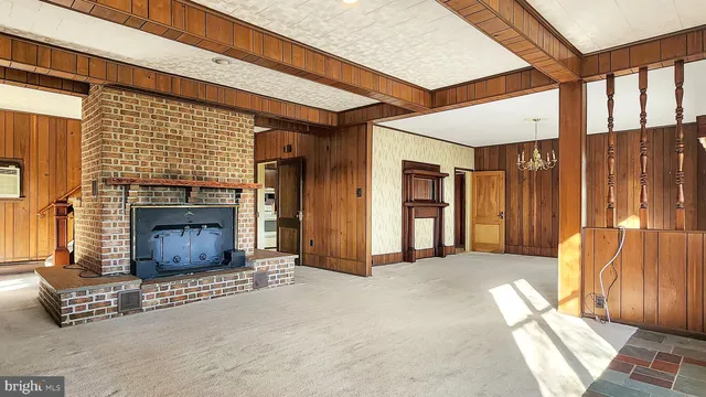 a view of an empty room and window
