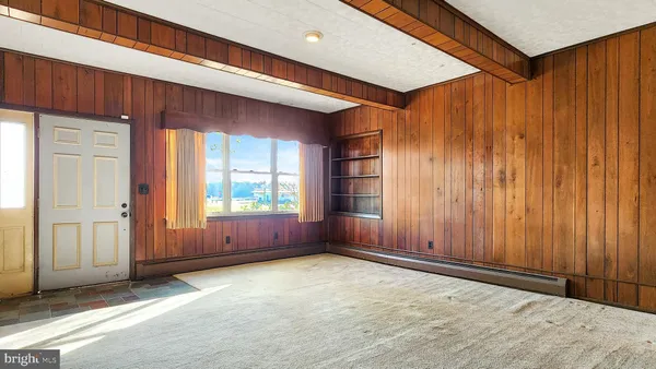 a view of a livingroom with a staircase