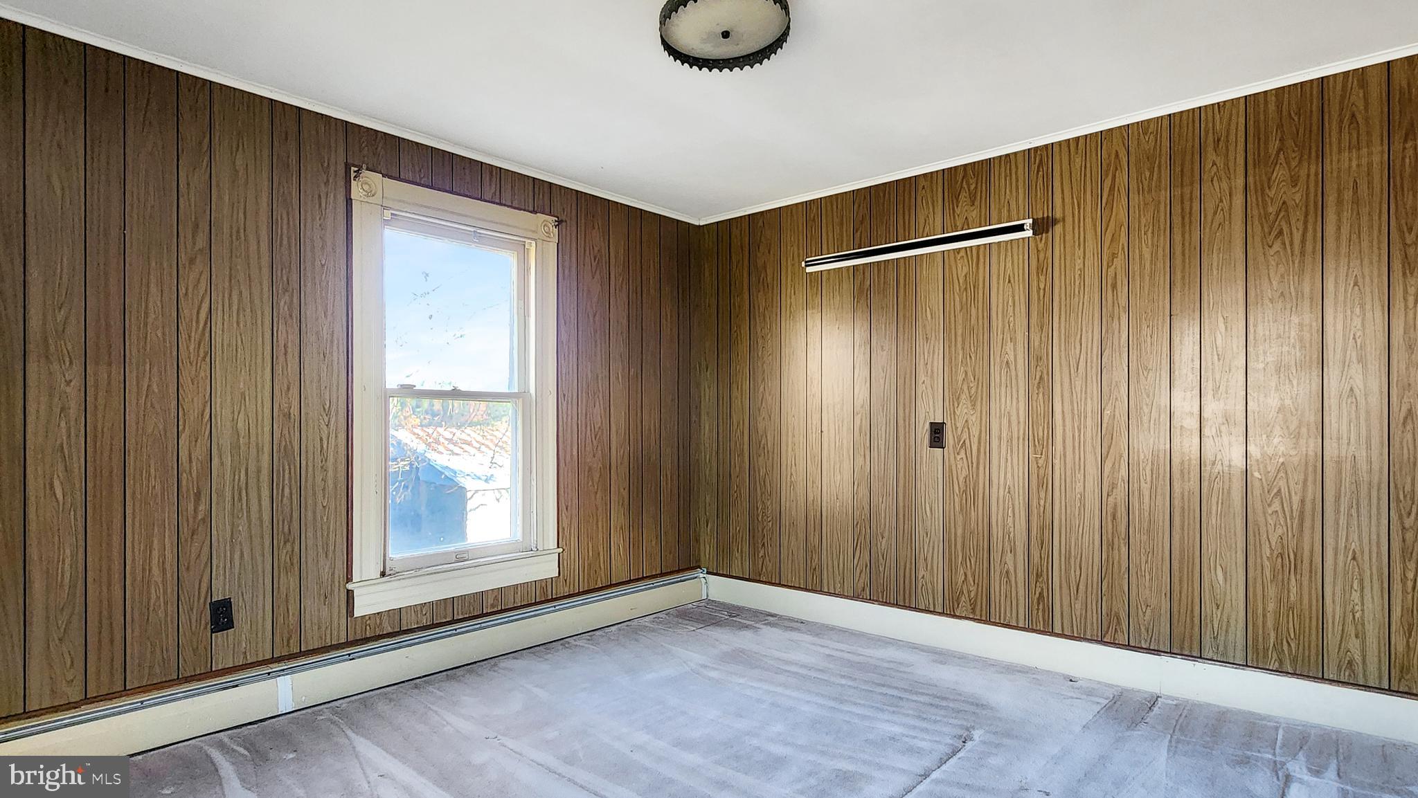 2431 Tulls Corner Road Pocomoke City, MD 21851 - Photo 18 of 28 an empty room with windows