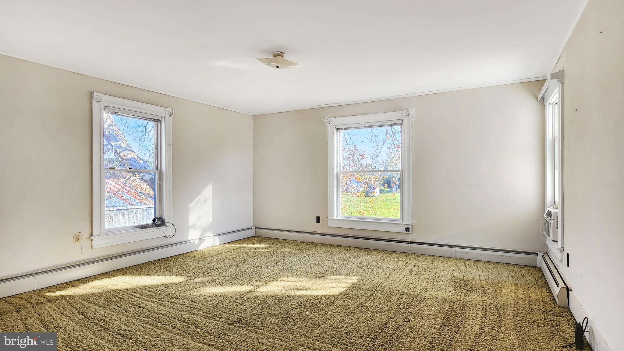 2431 Tulls Corner Road Pocomoke City, MD 21851 - Photo 20 of 28 a view of an empty room with a window