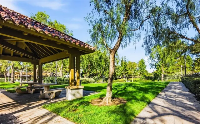 a view of a balcony with wooden fence