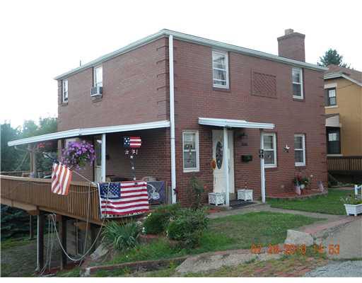 3053 Mt Troy Road Pittsburgh, PA 15212 - Photo 1 of 16 Exterior Front. Wrap around deck makes this home a winner.