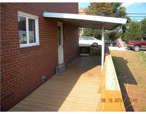 3053 Mt Troy Road Pittsburgh, PA 15212 - Photo 10 of 16 Patio/Deck. Deck wraps around to side entrance that leads to kitchen.