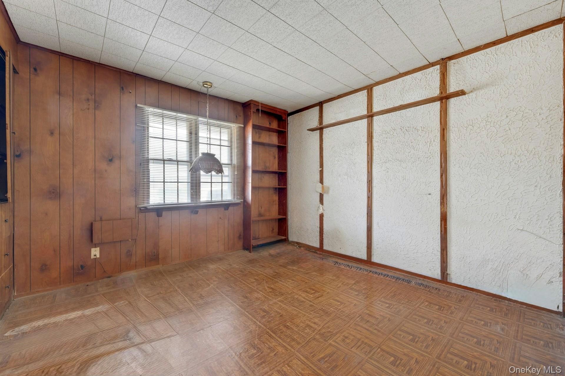 155 Mountaindale Road Yonkers, NY 10710 - Photo 11 of 24 a view of an empty room with a window
