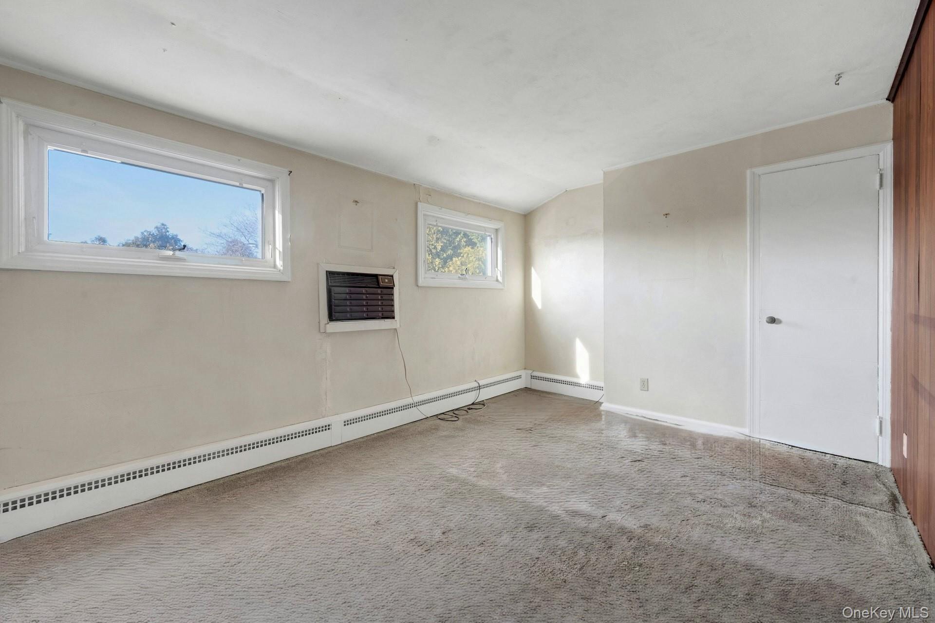 155 Mountaindale Road Yonkers, NY 10710 - Photo 15 of 24 a view of an empty room with painting on the wall