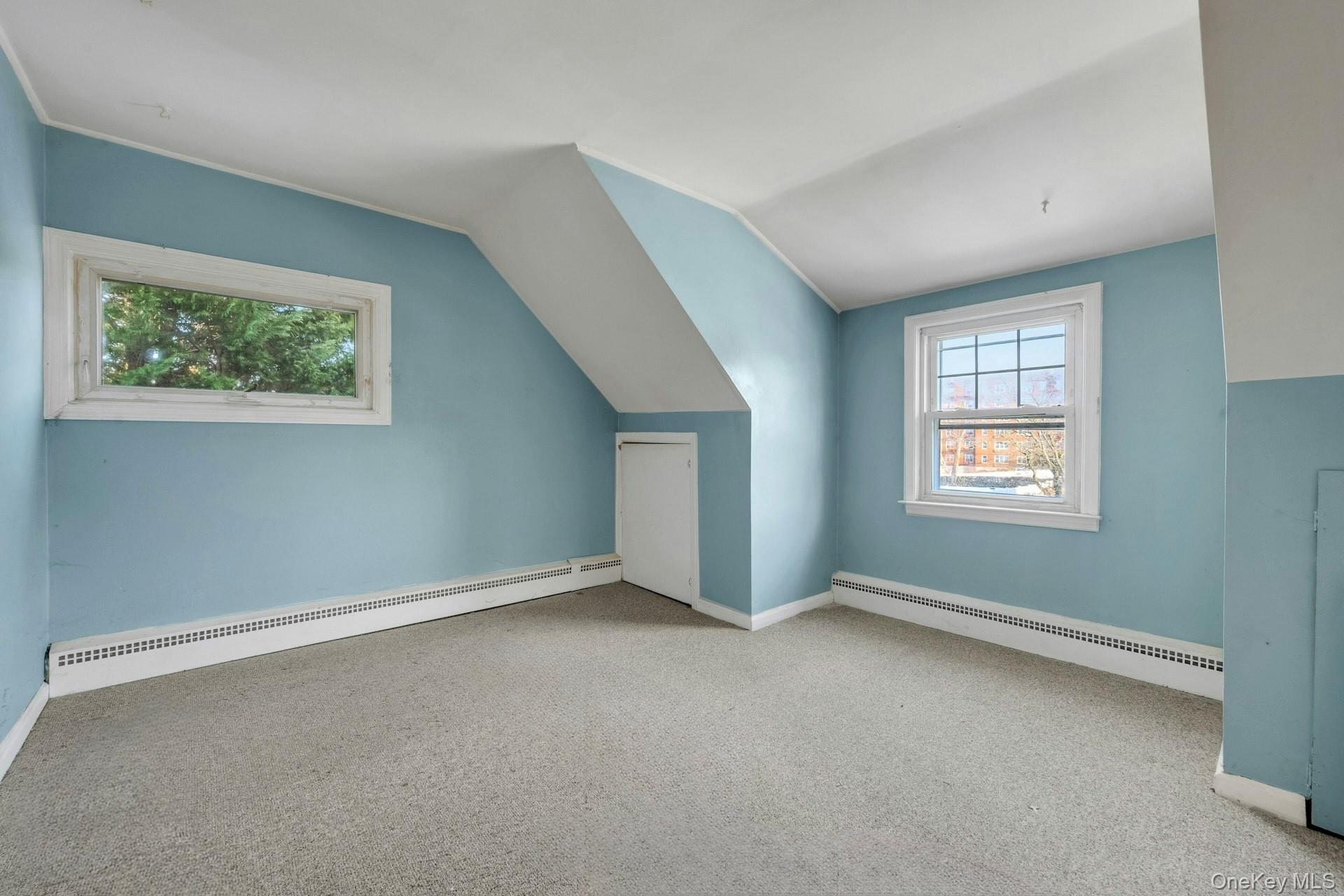 155 Mountaindale Road Yonkers, NY 10710 - Photo 17 of 24 an empty room with windows