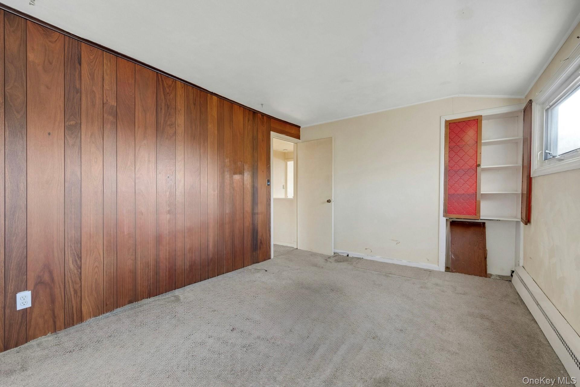 155 Mountaindale Road Yonkers, NY 10710 - Photo 19 of 24 a view of an empty room with a window