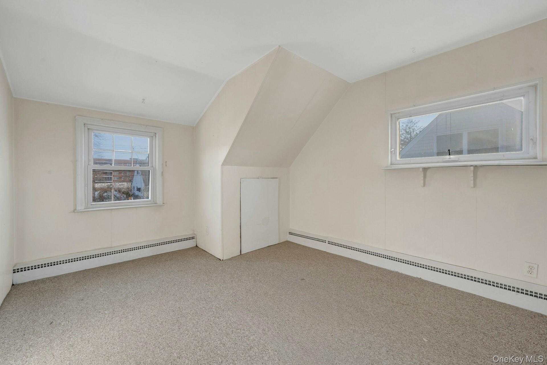155 Mountaindale Road Yonkers, NY 10710 - Photo 20 of 24 an empty room with a window