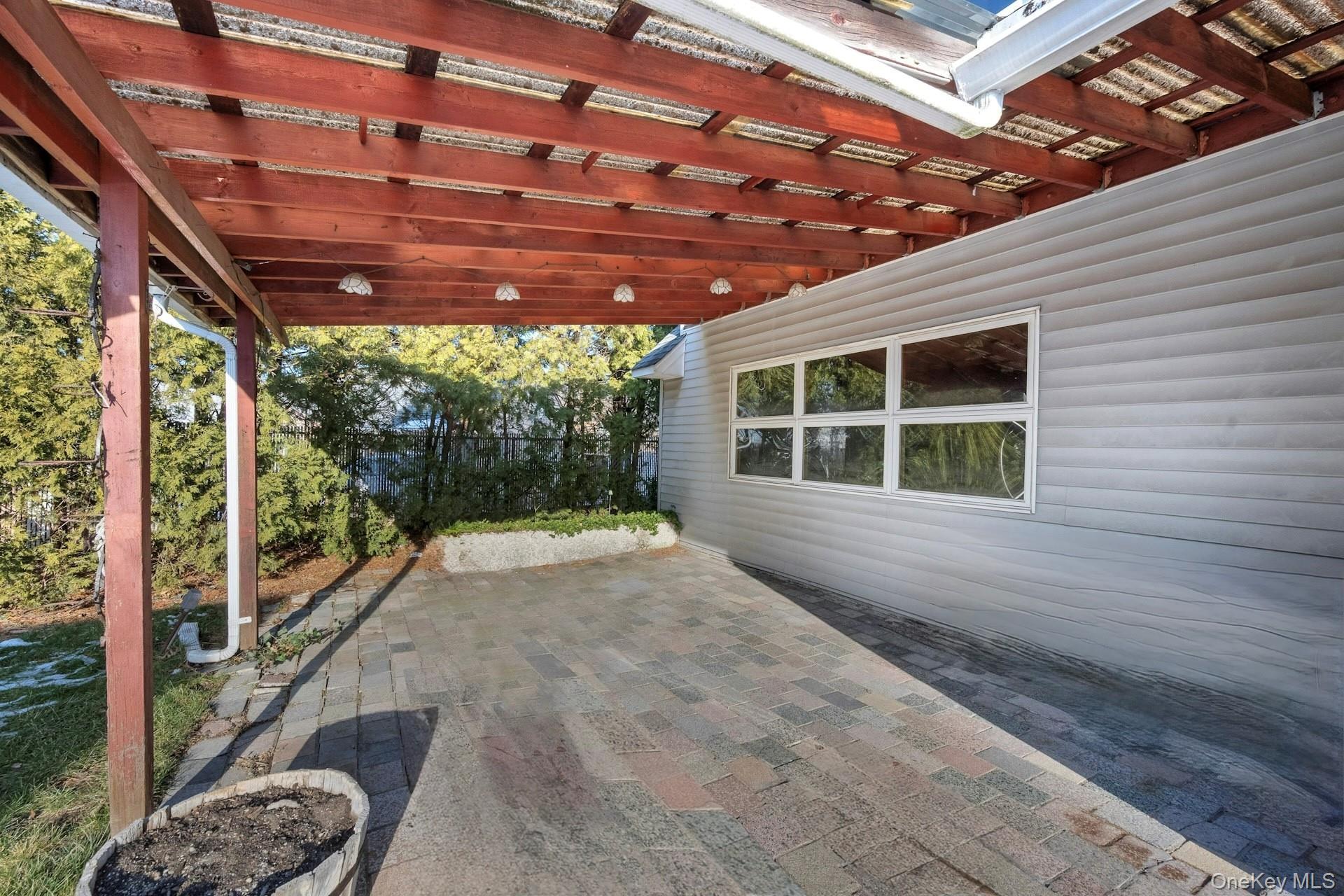 155 Mountaindale Road Yonkers, NY 10710 - Photo 22 of 24 a view of porch with large windows