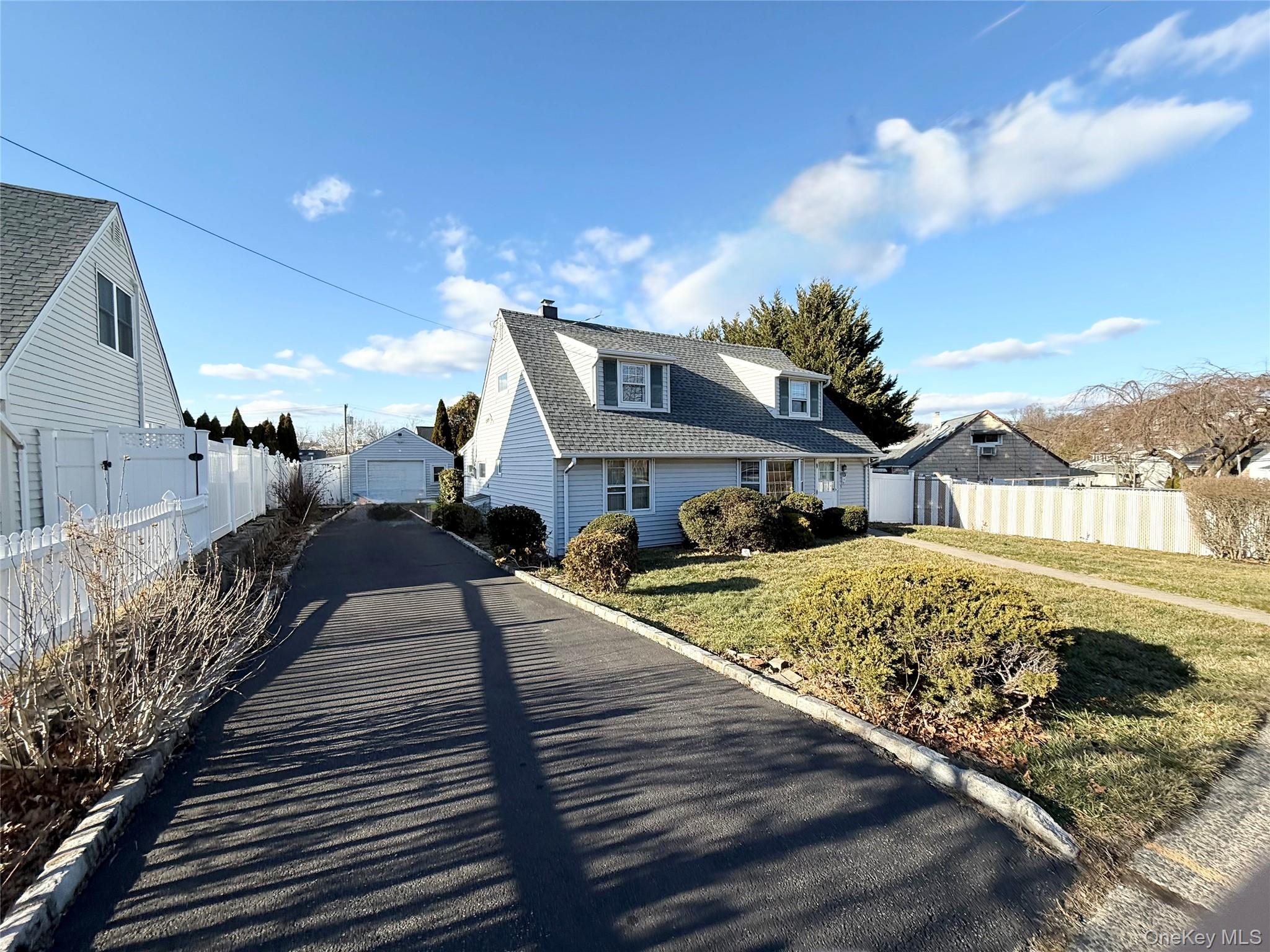 155 Mountaindale Road Yonkers, NY 10710 - Photo 4 of 24 a front view of a house with garden