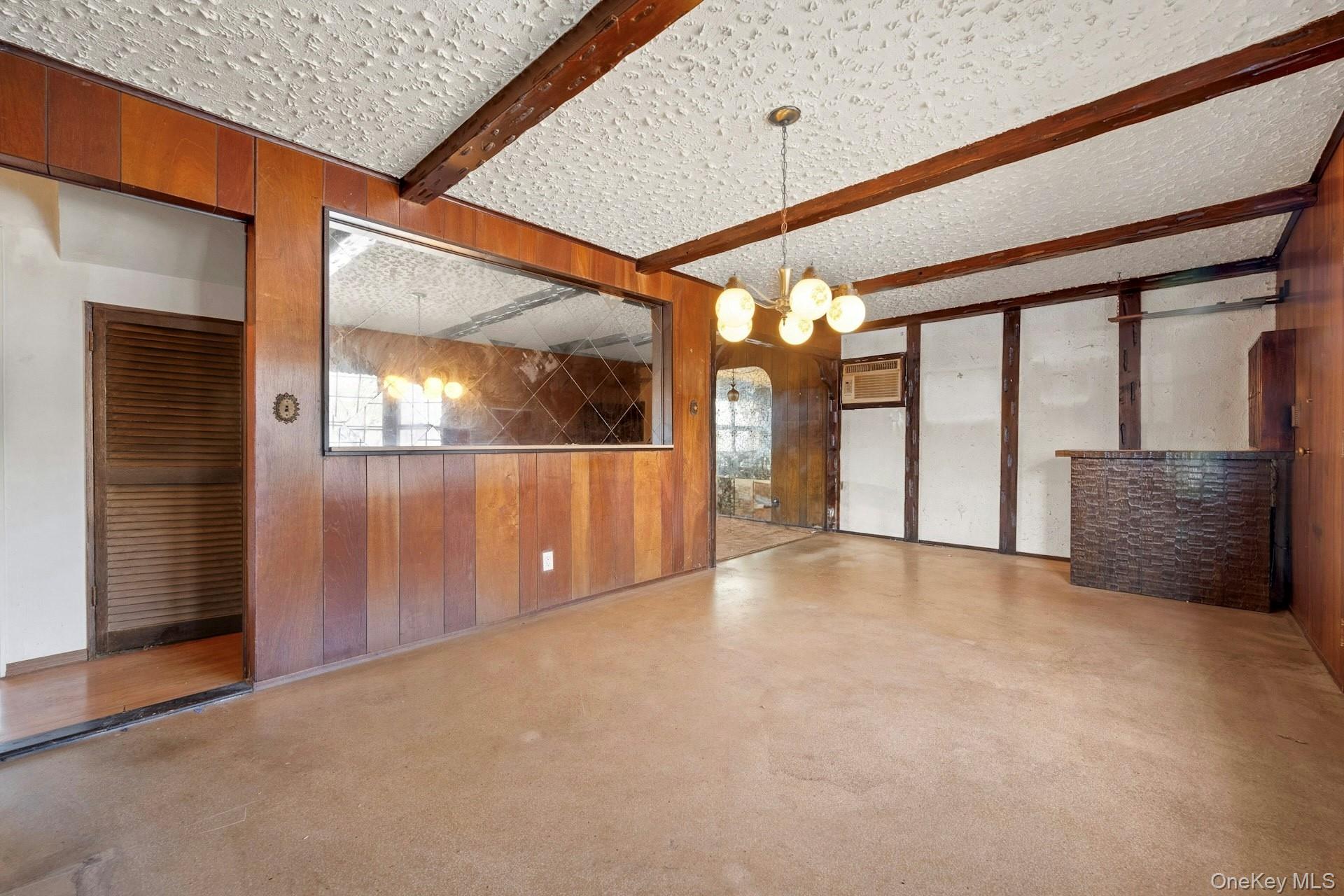 155 Mountaindale Road Yonkers, NY 10710 - Photo 7 of 24 a view of an empty room with a window