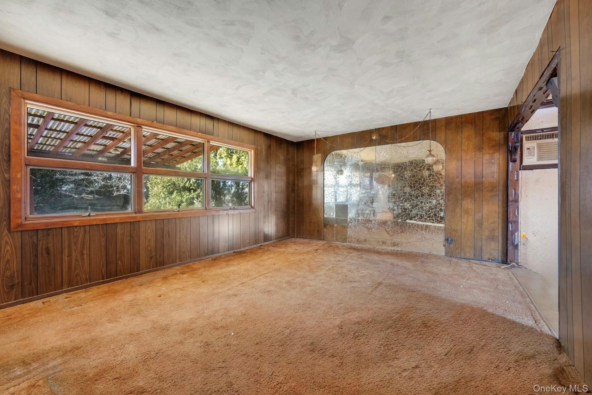 155 Mountaindale Road Yonkers, NY 10710 - Photo 9 of 24 an empty room with windows