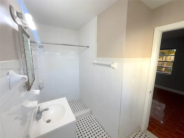 a view of an empty room and window