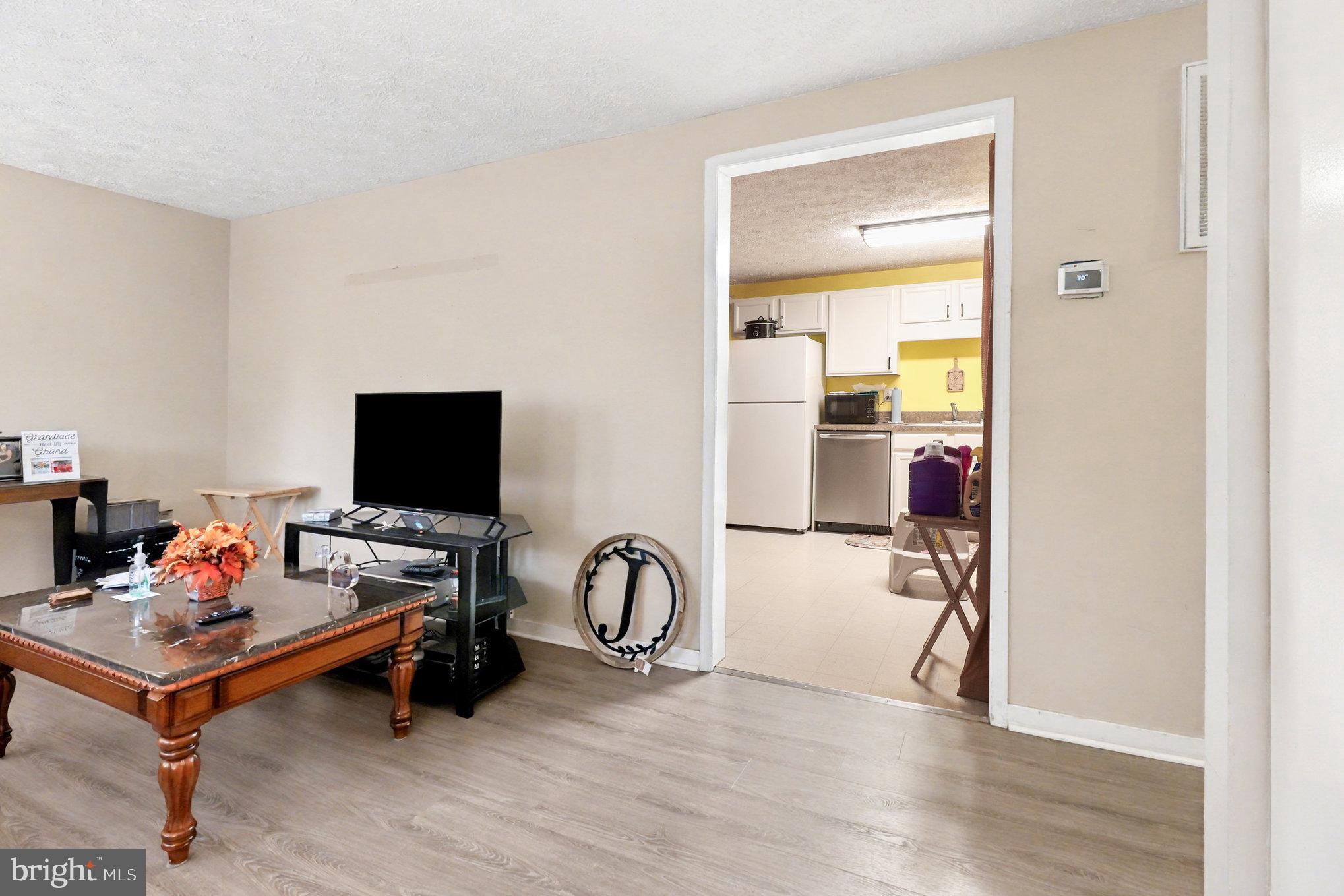 296 Devon Drive Ruther Glen, VA 22546 - Photo 6 of 22 Living room, kitchen view