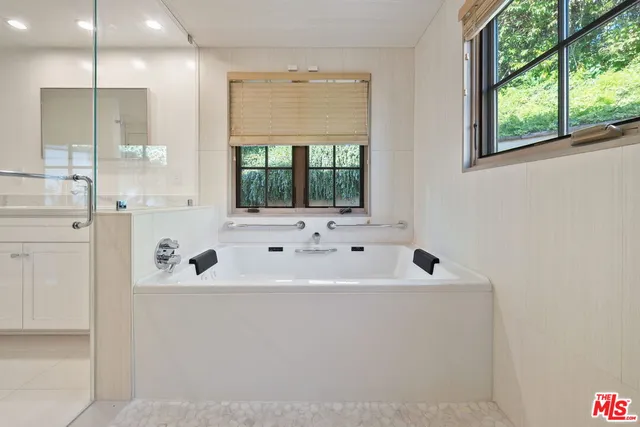 a bathroom with a sink and a bathtub