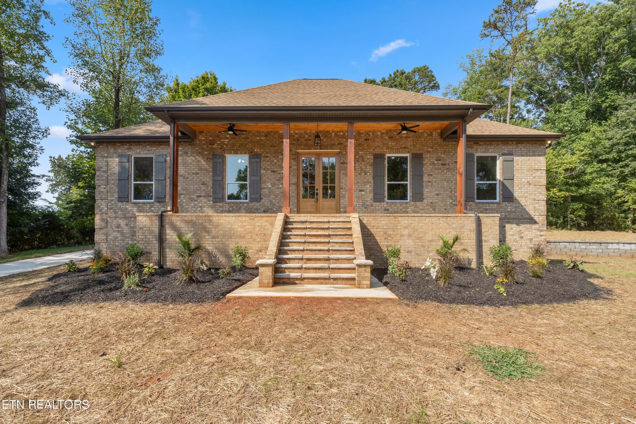2333 Mountain View Road Lenoir City, TN 37771 - Photo 1 of 54 a front view of a house with a yard