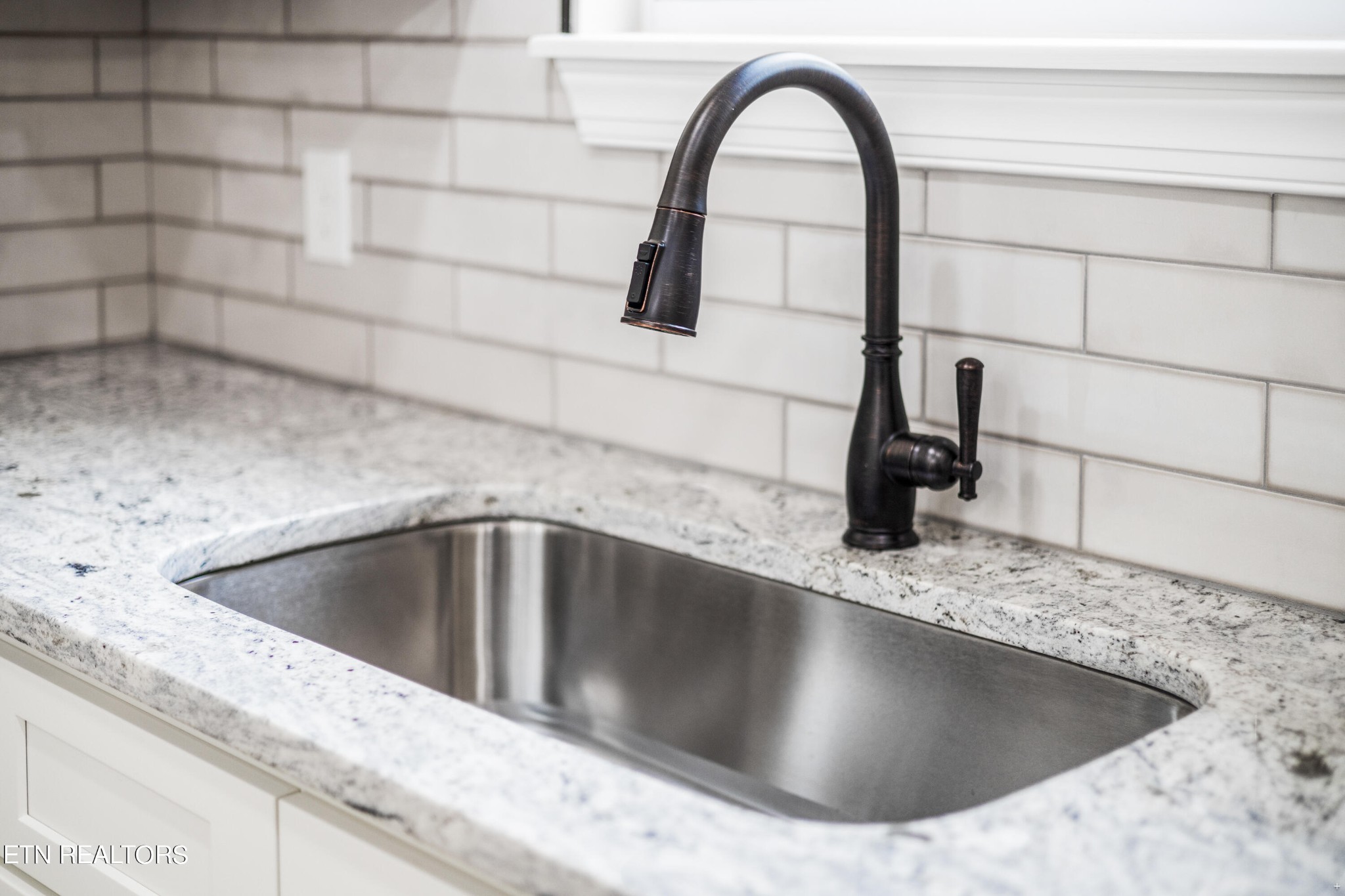2333 Mountain View Road Lenoir City, TN 37771 - Photo 14 of 54 a view of a sink and tap
