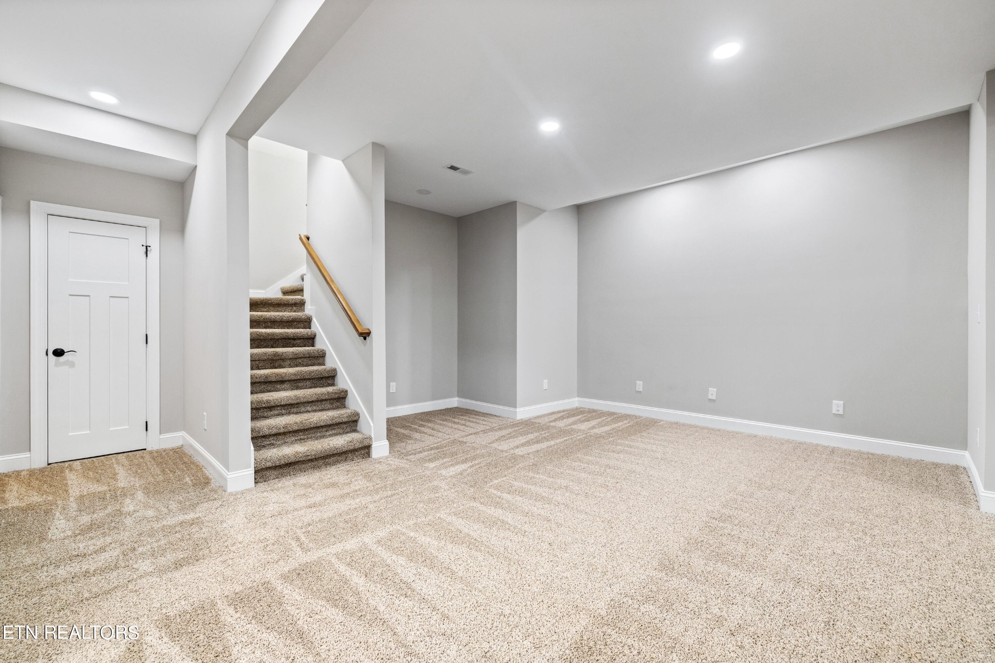 2333 Mountain View Road Lenoir City, TN 37771 - Photo 39 of 54 a view of an empty room with stairs