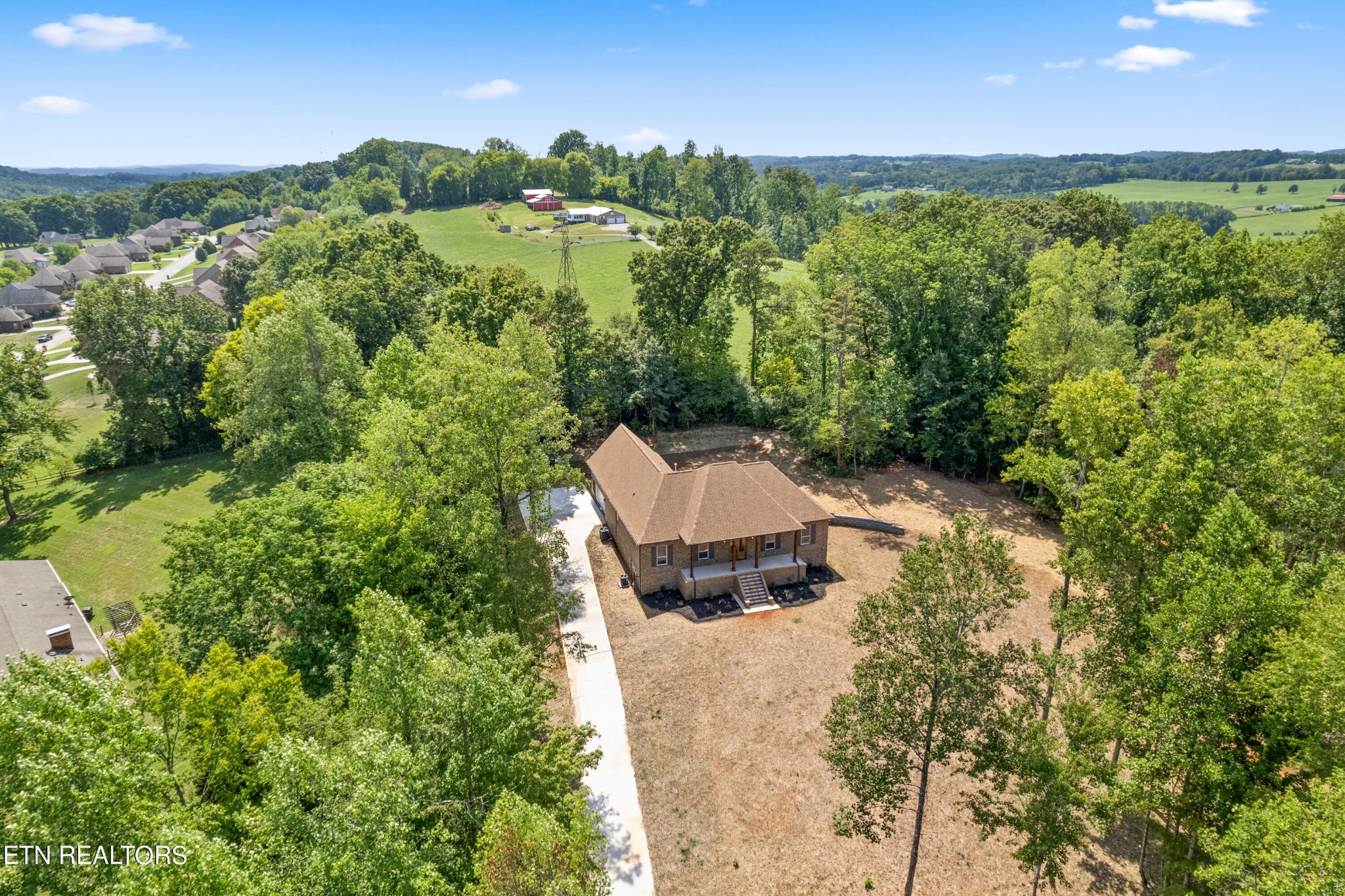 2333 Mountain View Road Lenoir City, TN 37771 - Photo 4 of 54 an aerial view of a house with a yard