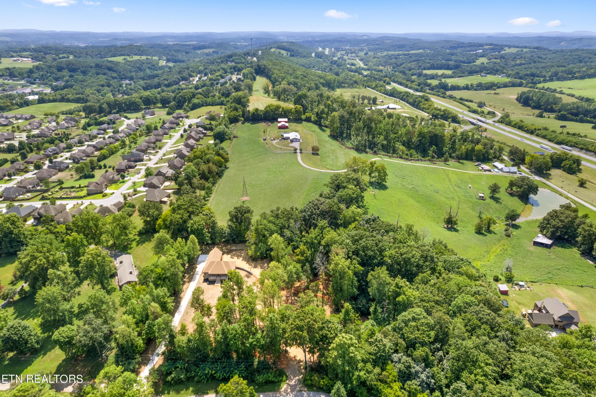 2333 Mountain View Road Lenoir City, TN 37771 - Photo 52 of 54 an aerial view of residential houses with outdoor space and river