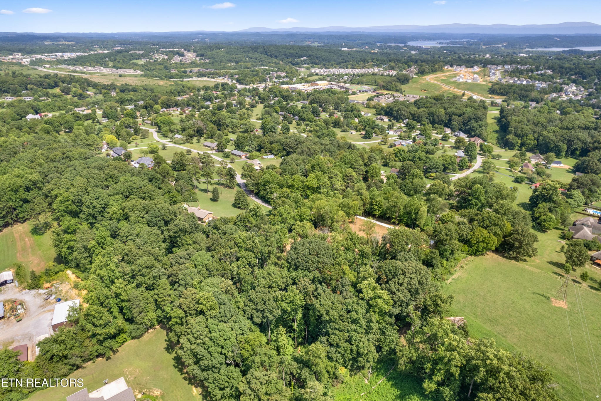 2333 Mountain View Road Lenoir City, TN 37771 - Photo 54 of 54 a view of a city with lush green forest