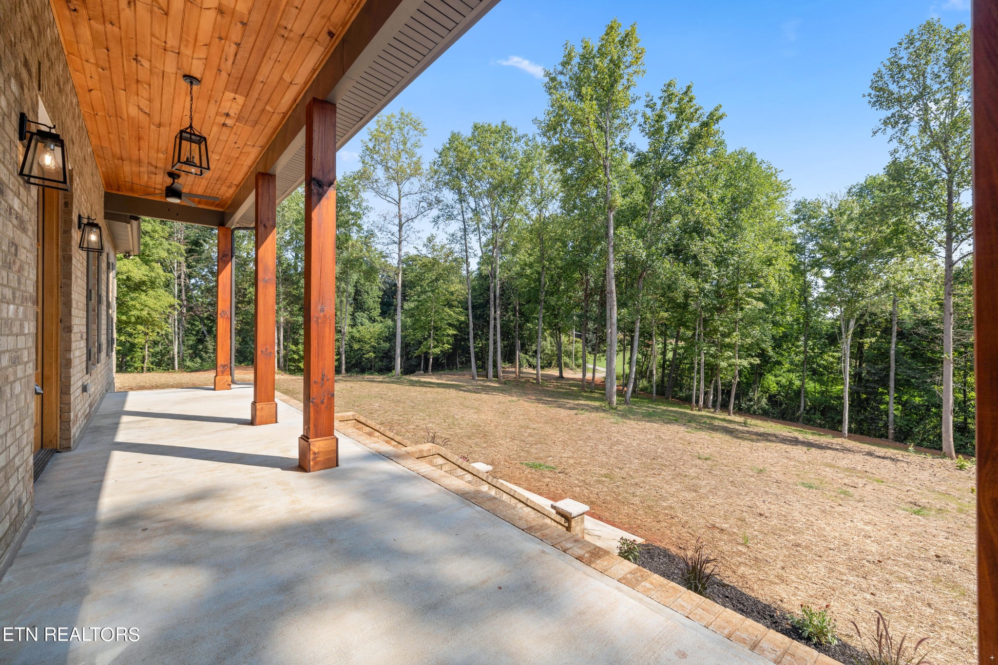 2333 Mountain View Road Lenoir City, TN 37771 - Photo 8 of 54 a view of a house with backyard and tree