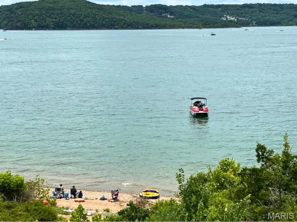 $424,900 | 700 Emerald Point Drive, Unit 302, Hollister, MO 65672