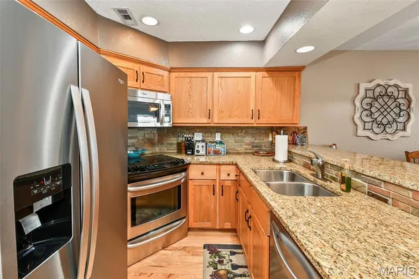 $424,900 | 700 Emerald Point Drive, Unit 302, Hollister, MO 65672