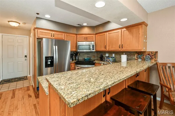 $424,900 | 700 Emerald Point Drive, Unit 302, Hollister, MO 65672