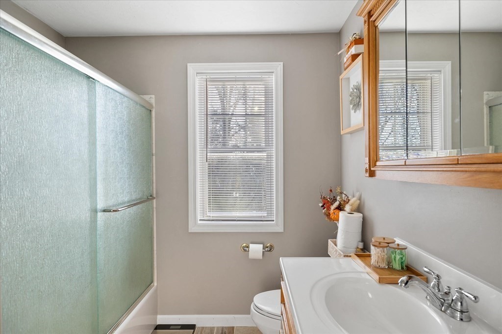 20 Alpine Trail Auburn, MA 01501 - Photo 11 of 25 a bathroom with a sink and a window