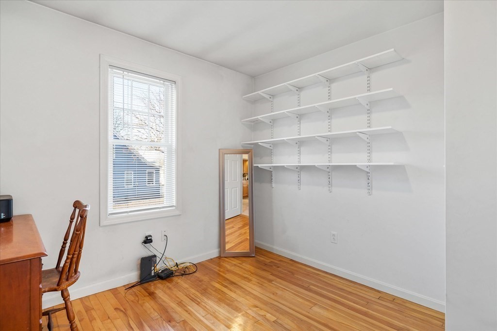 20 Alpine Trail Auburn, MA 01501 - Photo 14 of 25 a view of a room with wooden floor and windows