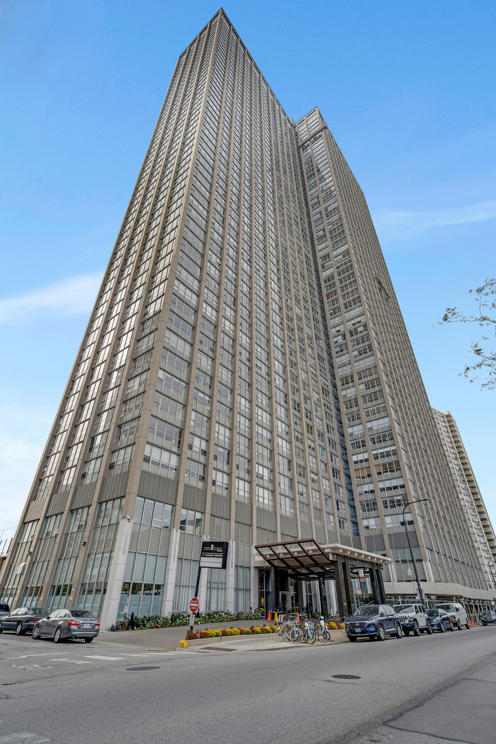 655 West Irving Park Road, Unit 2401 Chicago, IL 60613 - Photo 1 of 32 front view of a building