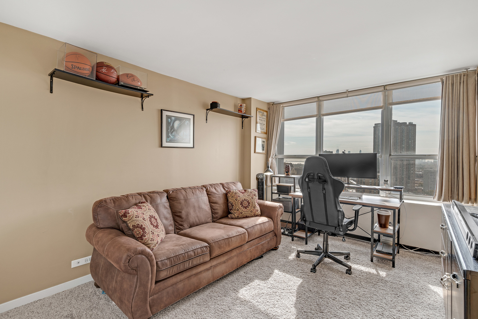 655 West Irving Park Road, Unit 2401 Chicago, IL 60613 - Photo 21 of 32 a living room with furniture