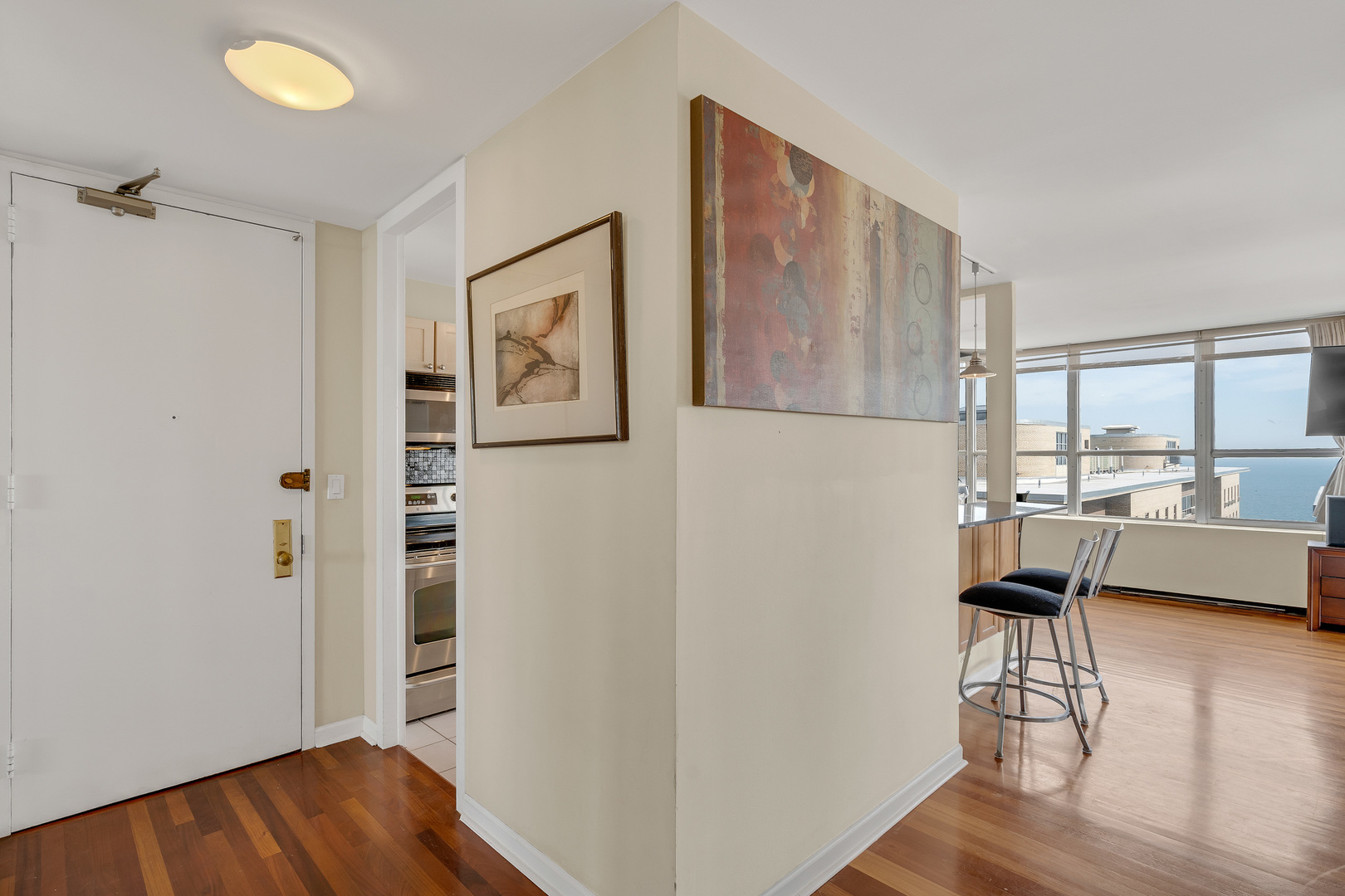 655 West Irving Park Road, Unit 2401 Chicago, IL 60613 - Photo 23 of 32 a view of a workspace with wooden floor and a workspace