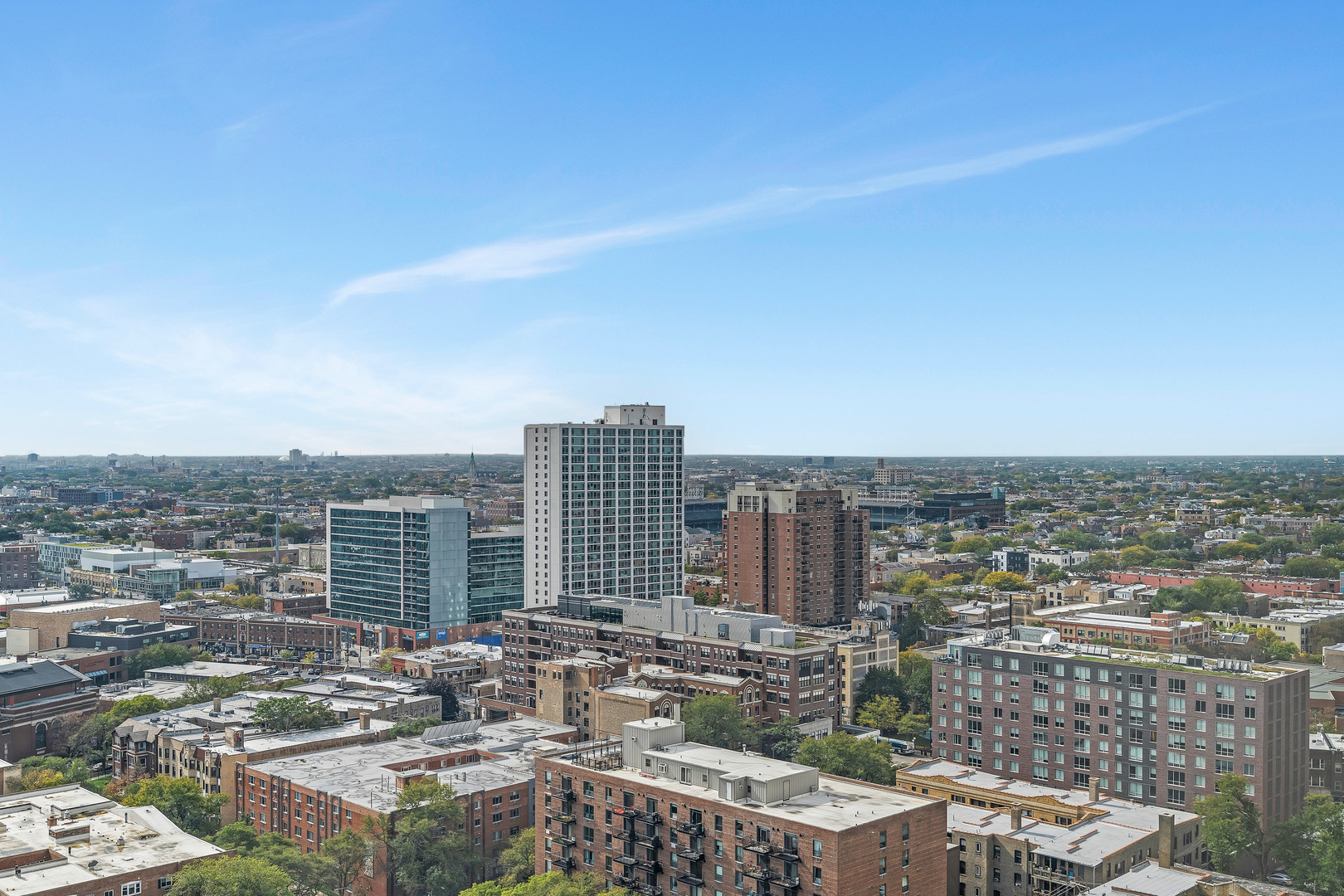 655 West Irving Park Road, Unit 2401 Chicago, IL 60613 - Photo 7 of 32 a view of city with tall buildings