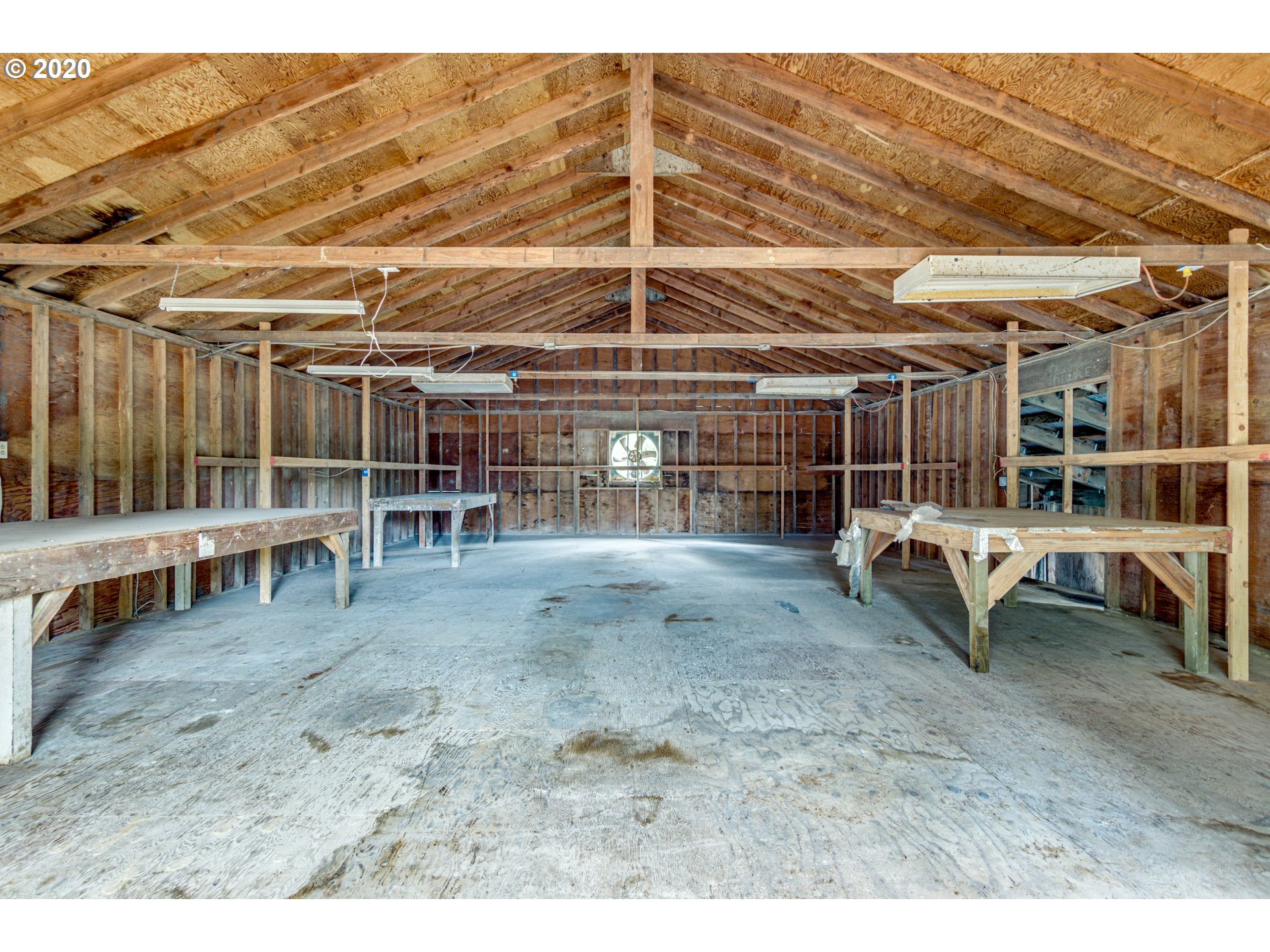 8767 Southeast Bull Run Road Corbett, OR 97019 - Photo 13 of 32 a view of an empty room with wooden ceiling