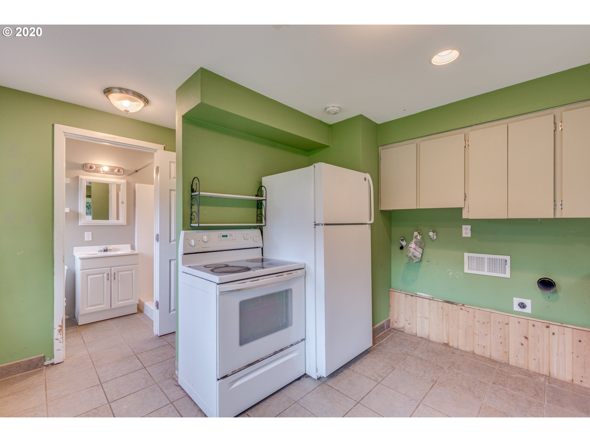 8767 Southeast Bull Run Road Corbett, OR 97019 - Photo 28 of 32 a kitchen with a cabinets and a stove top oven