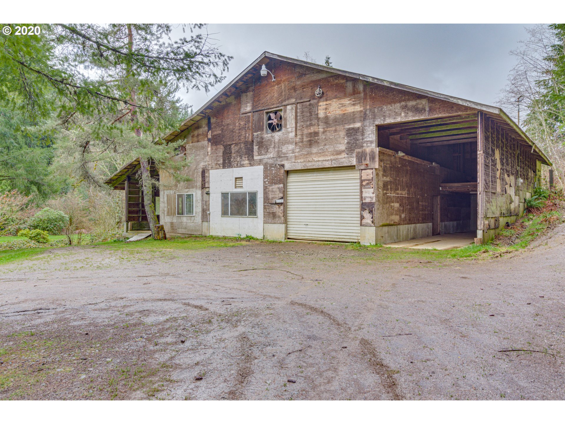 8767 Southeast Bull Run Road Corbett, OR 97019 - Photo 8 of 32 a view of a house with a yard