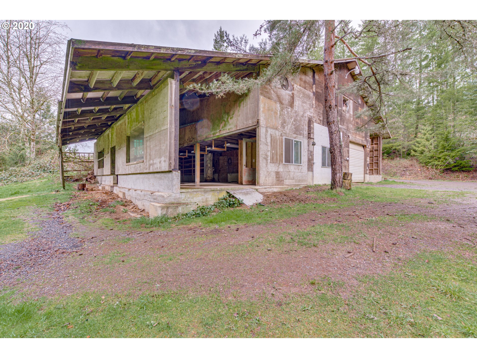 8767 Southeast Bull Run Road Corbett, OR 97019 - Photo 9 of 32 a front view of a house with garden